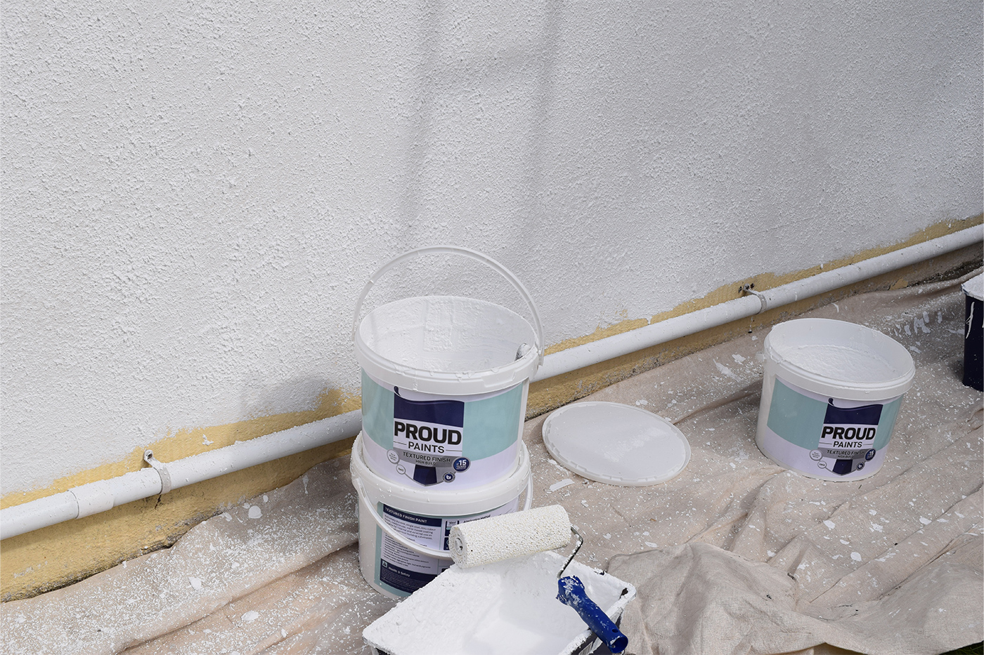 Proud Paints expert help and advice how to apply textured high build paint advice and steps to painting your homes interior and exterior choosing paint colours from Proud Paints confident colour collection will bring your homes masonry walls to life
